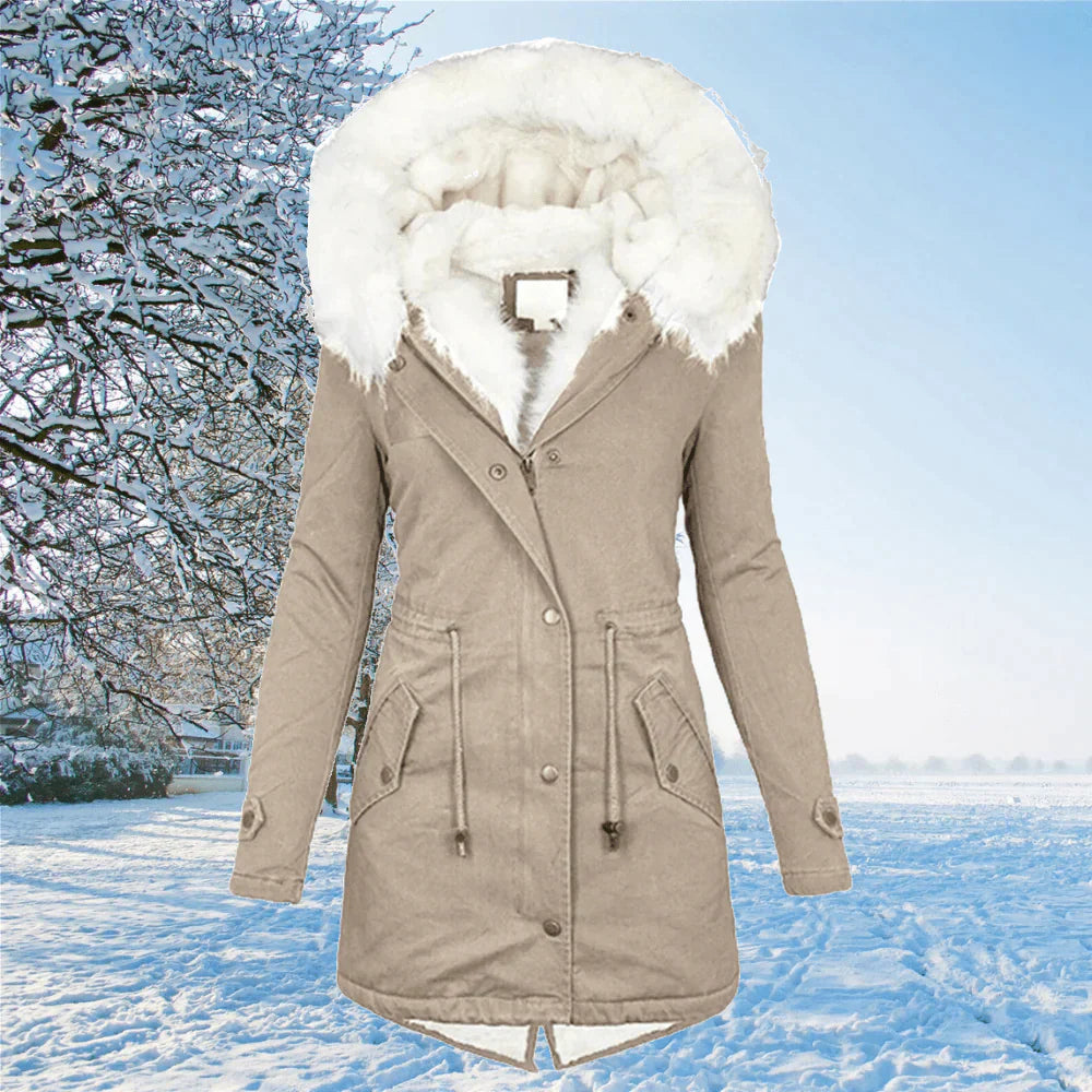 Nora - The comfortable winter coat with hood and fur lining.